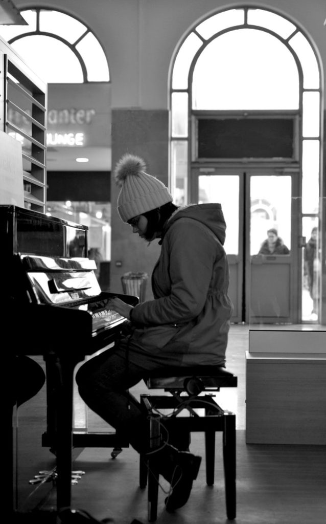 A Piano Student Playing in Public